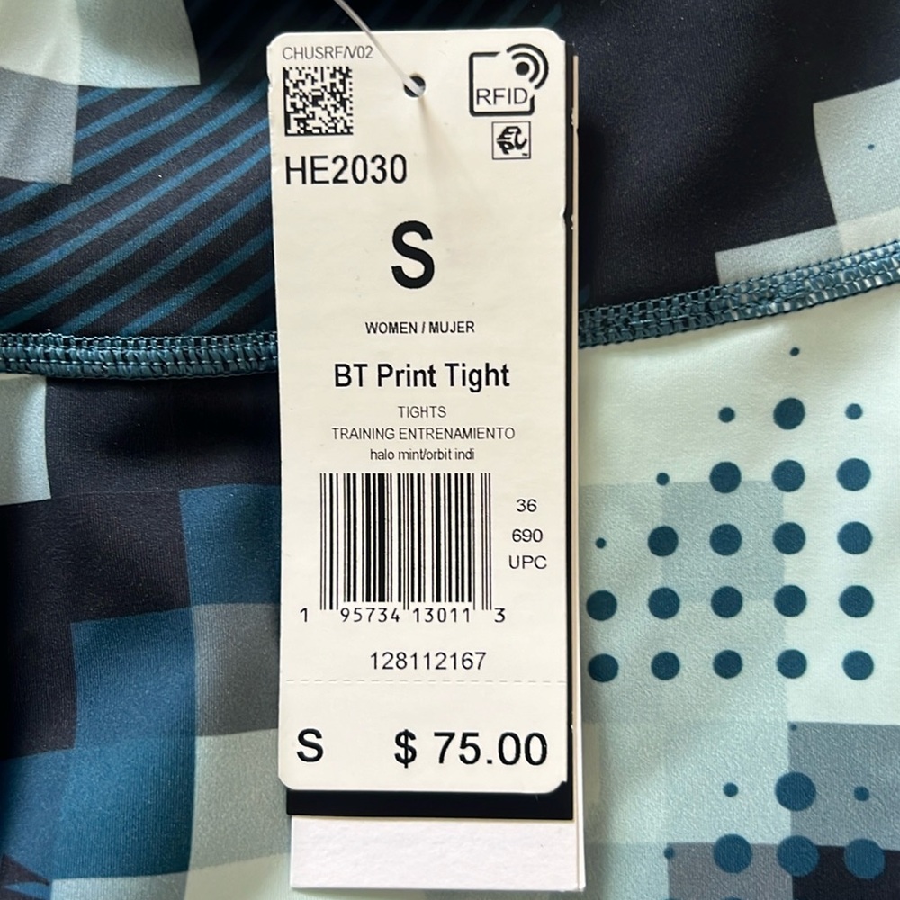 Peloton for Adidas Women’s Peloton gym tights in a Turquoise geometric pattern.
